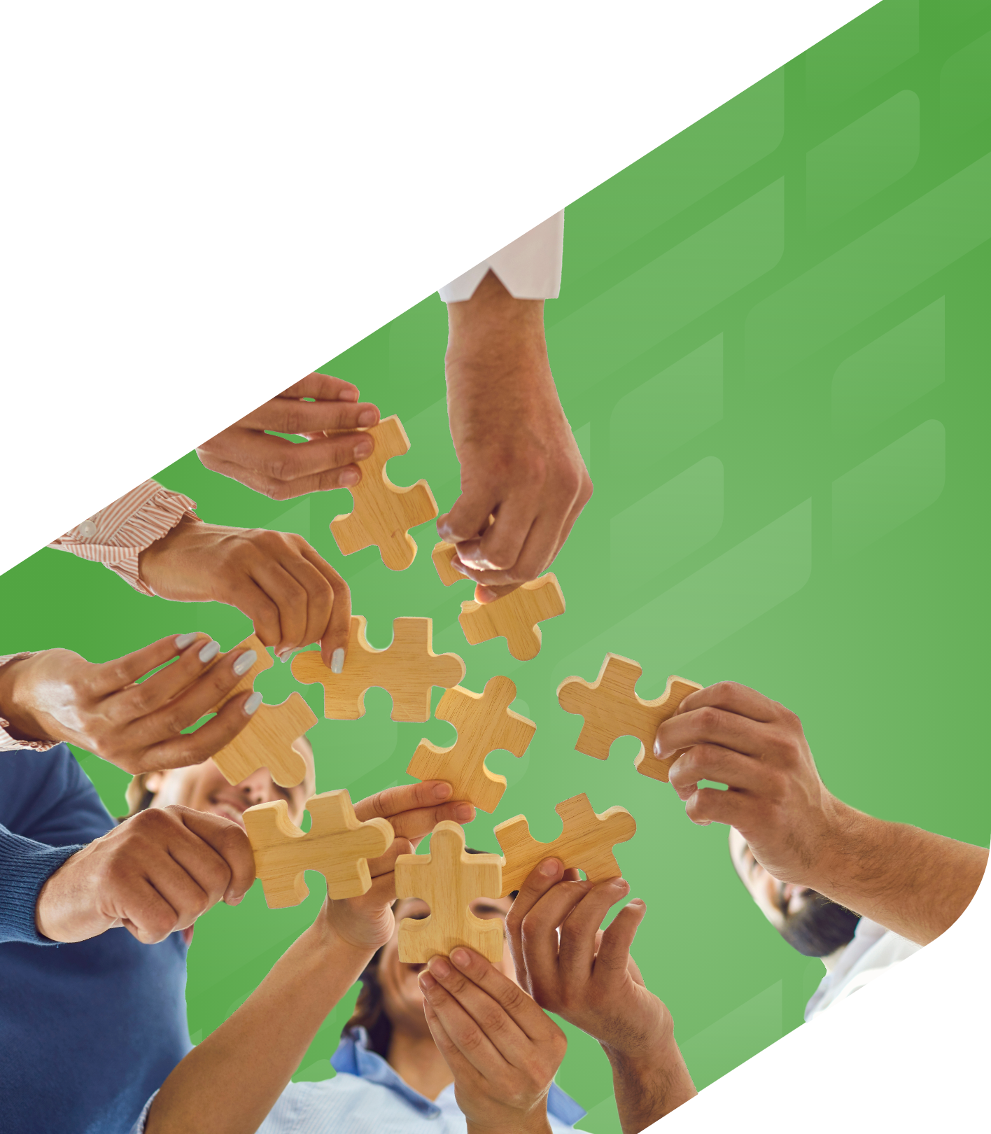 Hands holding puzzle pieces together